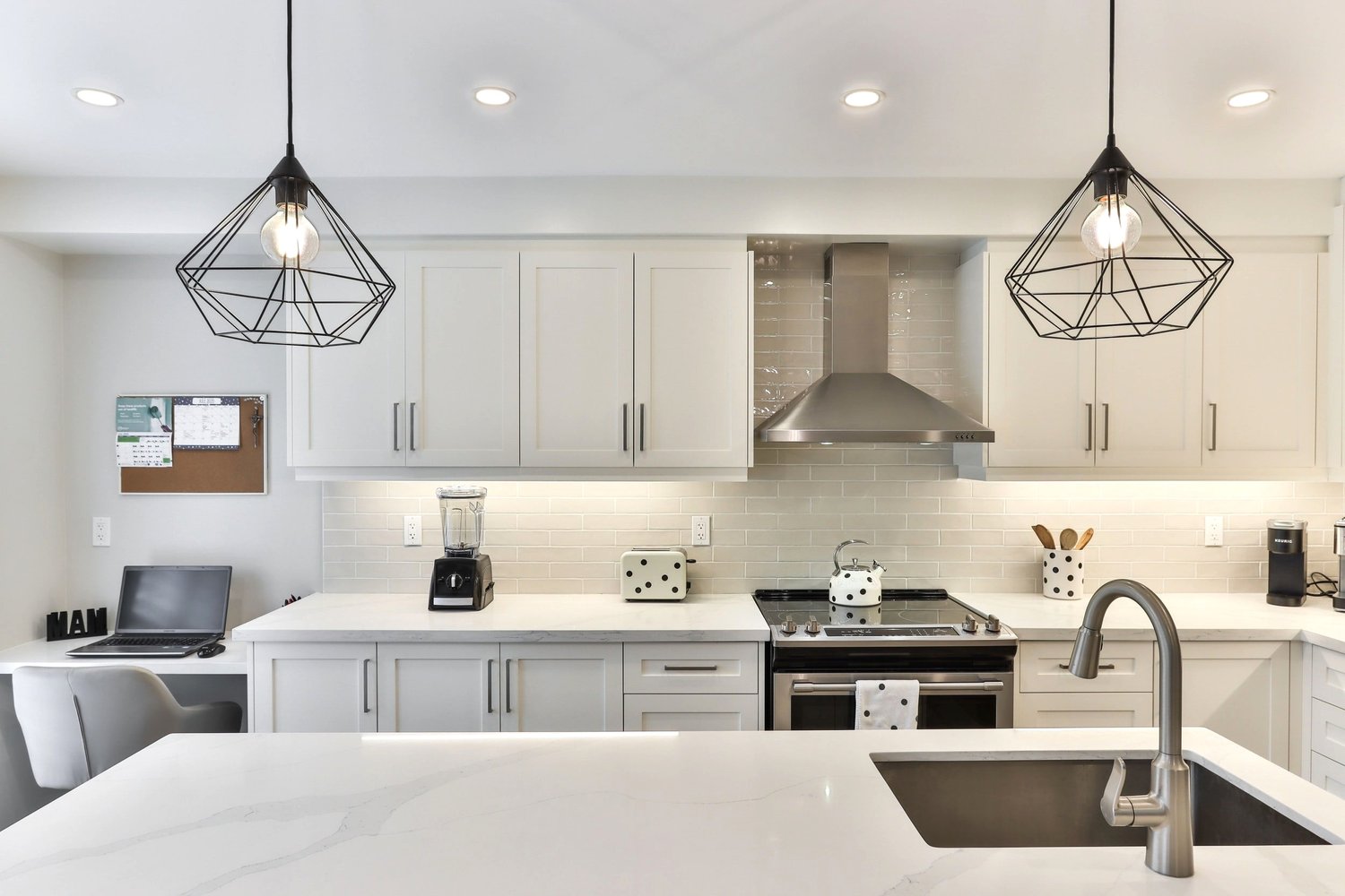 Kitchen cabinets painted in white